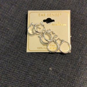 Three pair of silver hoops